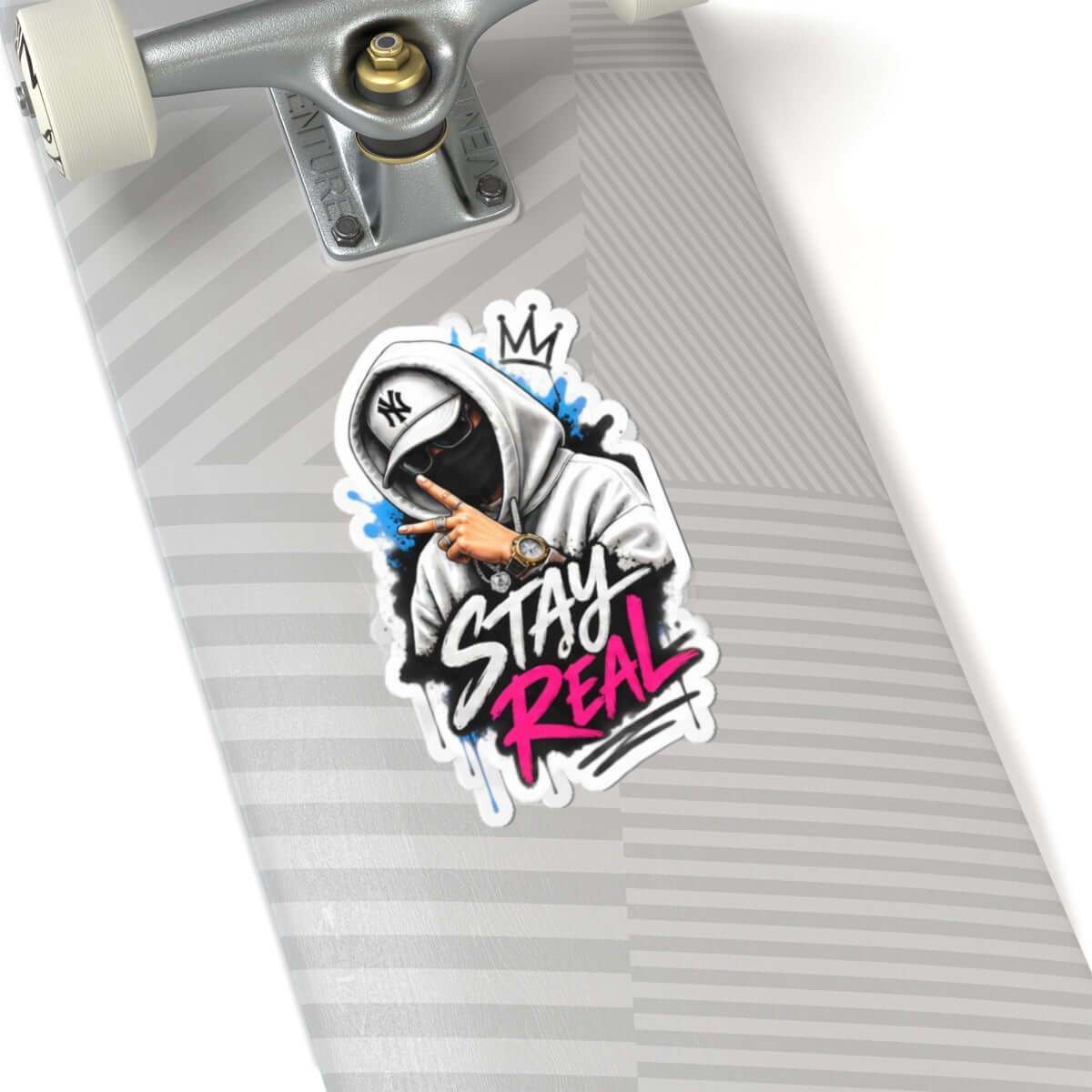 Custom kiss-cut stickers design featuring a cool character and the phrase 'STAY REAL' on a skateboard.