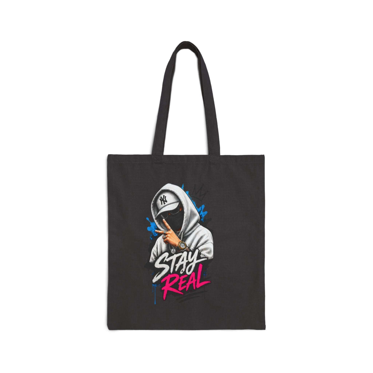 Durable cotton canvas tote bag featuring a stylish design with a hooded figure and the phrase 'STAY REAL'.