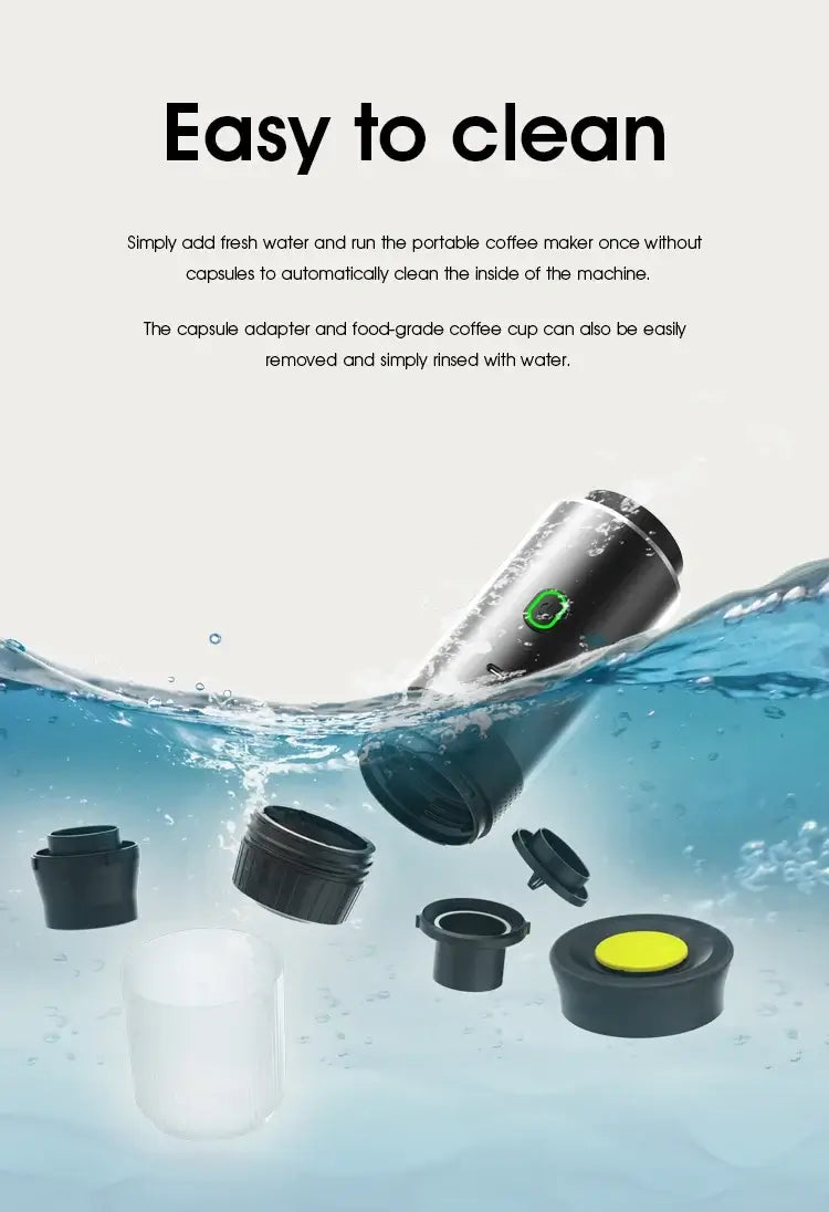 Portable espresso coffee maker for travel submerged in water, showcasing easy cleaning features.