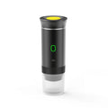 Portable espresso coffee maker for travel with modern design and built-in power indicator.