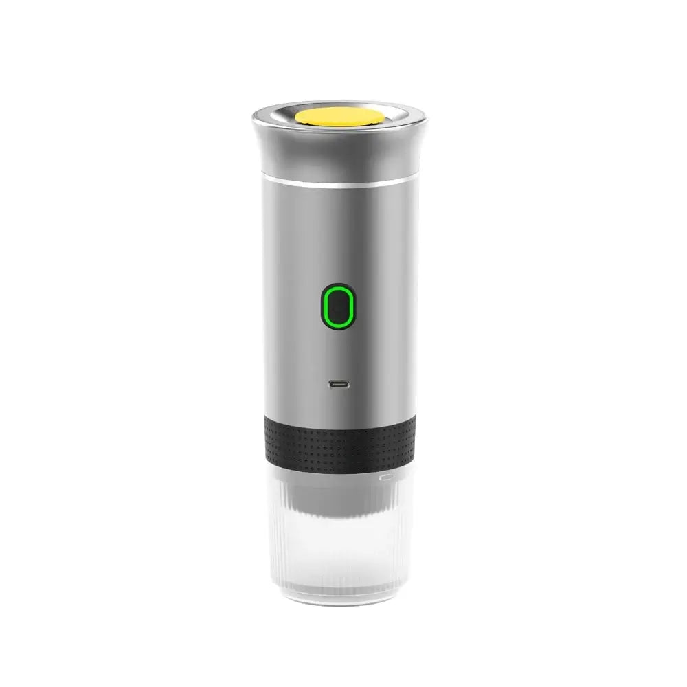 Portable espresso coffee maker for travel, sleek silver design with power button and transparent base.